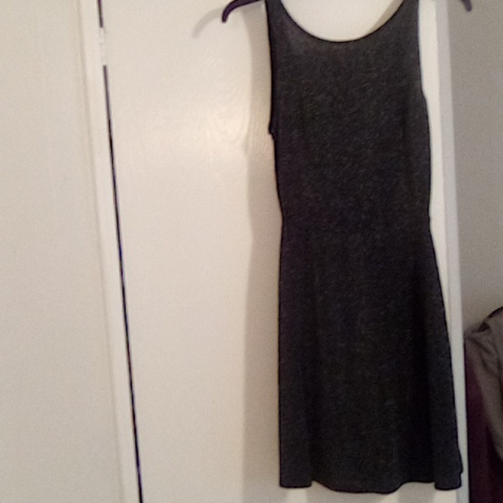Knee length glitter dress, back is vCut.